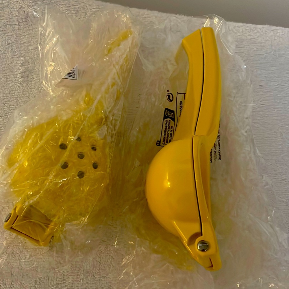 Metal lemon are small orange squeezer  four for 10.00 .